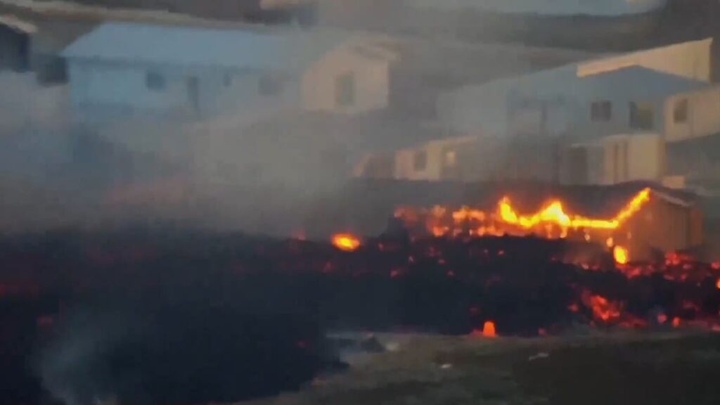 Iceland volcano live: Three Grindavik homes burn but lava defences save rest of town